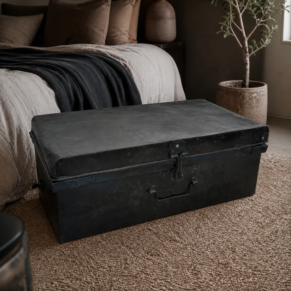 Midnight Groove Storage Chest staged in a moody contemporary bedroom.